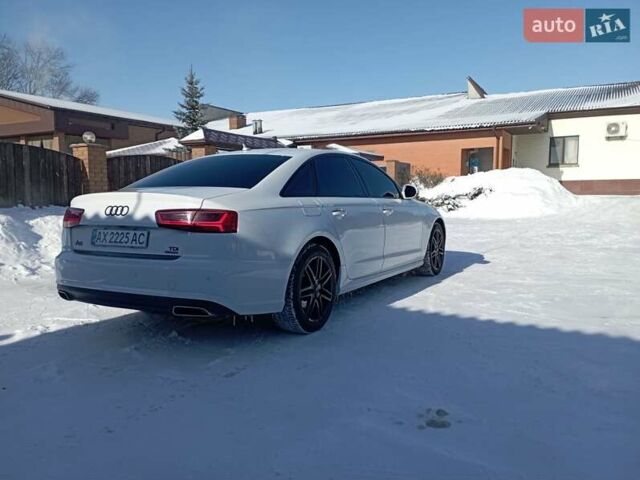 Білий Ауді А6, об'ємом двигуна 1.97 л та пробігом 94 тис. км за 25000 $, фото 1 на Automoto.ua