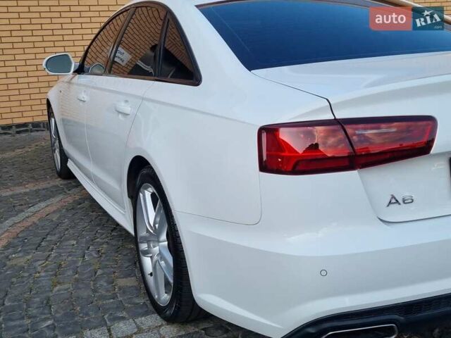 Білий Ауді А6, об'ємом двигуна 2 л та пробігом 290 тис. км за 14300 $, фото 12 на Automoto.ua