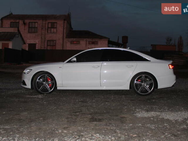 Белый Ауди А6, объемом двигателя 1.98 л и пробегом 65 тыс. км за 22500 $, фото 9 на Automoto.ua