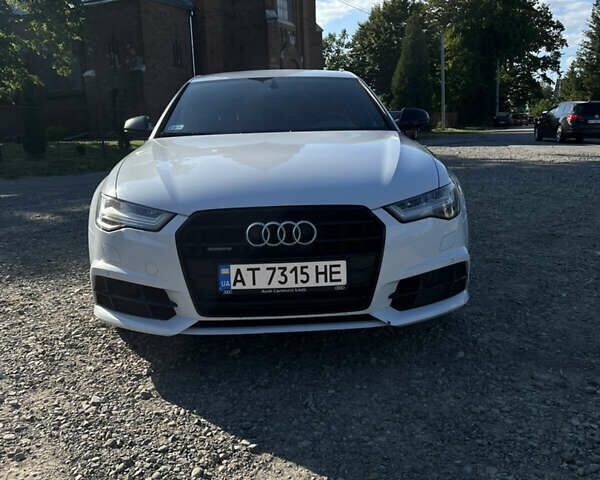 Белый Ауди А6, объемом двигателя 1.98 л и пробегом 204 тыс. км за 23000 $, фото 1 на Automoto.ua