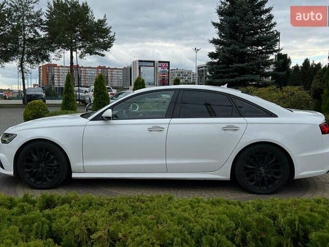 Білий Ауді А6, об'ємом двигуна 1.98 л та пробігом 172 тис. км за 17650 $, фото 3 на Automoto.ua