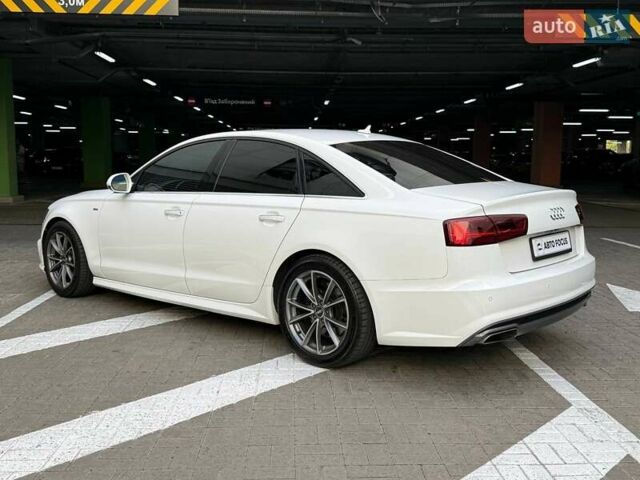 Белый Ауди А6, объемом двигателя 1.98 л и пробегом 163 тыс. км за 17990 $, фото 3 на Automoto.ua