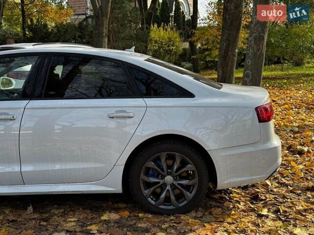 Білий Ауді А6, об'ємом двигуна 2 л та пробігом 89 тис. км за 21990 $, фото 9 на Automoto.ua