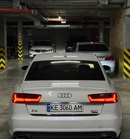 Білий Ауді А6, об'ємом двигуна 1.98 л та пробігом 161 тис. км за 20000 $, фото 4 на Automoto.ua