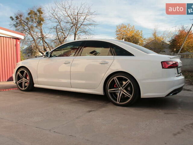 Белый Ауди А6, объемом двигателя 1.98 л и пробегом 65 тыс. км за 22500 $, фото 1 на Automoto.ua