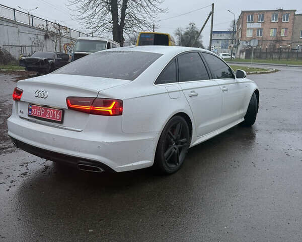 Белый Ауди А6, объемом двигателя 2 л и пробегом 273 тыс. км за 16000 $, фото 2 на Automoto.ua