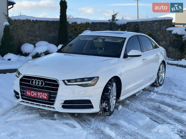 Білий Ауді А6, об'ємом двигуна 2 л та пробігом 132 тис. км за 18700 $, фото 1 на Automoto.ua