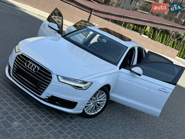 Белый Ауди А6, объемом двигателя 2 л и пробегом 124 тыс. км за 24400 $, фото 2 на Automoto.ua