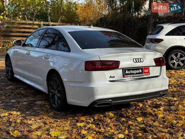 Білий Ауді А6, об'ємом двигуна 2 л та пробігом 89 тис. км за 21990 $, фото 8 на Automoto.ua