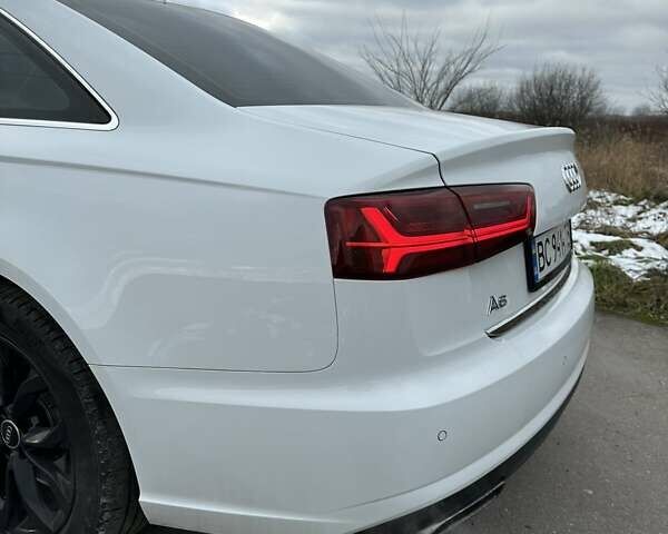 Білий Ауді А6, об'ємом двигуна 1.97 л та пробігом 173 тис. км за 21500 $, фото 1 на Automoto.ua