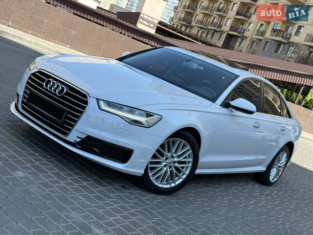 Белый Ауди А6, объемом двигателя 2 л и пробегом 124 тыс. км за 24400 $, фото 1 на Automoto.ua