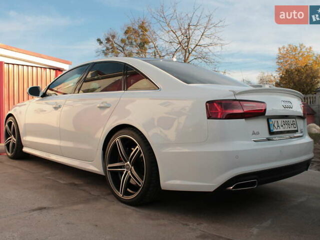 Белый Ауди А6, объемом двигателя 1.98 л и пробегом 65 тыс. км за 22500 $, фото 3 на Automoto.ua