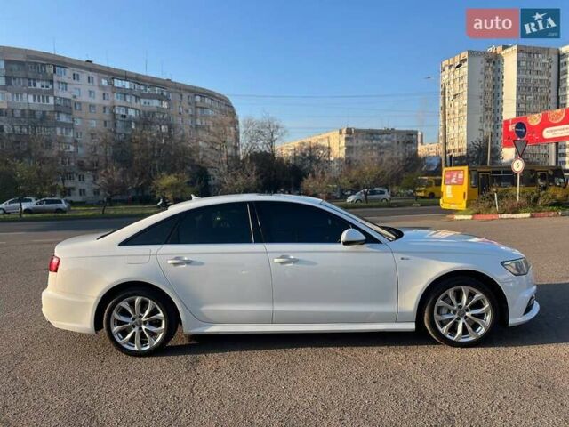 Белый Ауди А6, объемом двигателя 1.98 л и пробегом 130 тыс. км за 16700 $, фото 11 на Automoto.ua