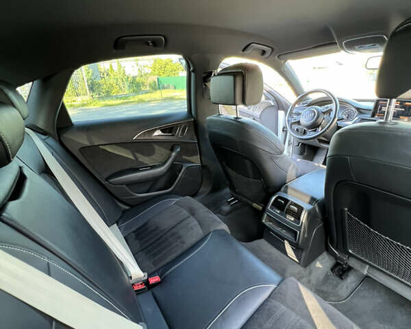 Белый Ауди А6, объемом двигателя 1.98 л и пробегом 204 тыс. км за 23000 $, фото 13 на Automoto.ua