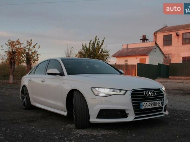 Белый Ауди А6, объемом двигателя 1.98 л и пробегом 65 тыс. км за 22500 $, фото 6 на Automoto.ua