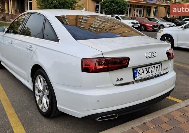 Белый Ауди А6, объемом двигателя 2 л и пробегом 155 тыс. км за 22999 $, фото 25 на Automoto.ua
