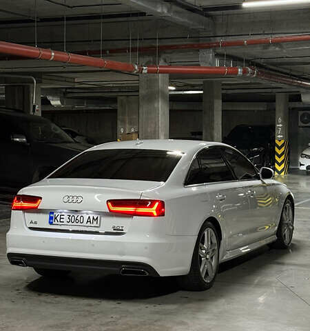 Білий Ауді А6, об'ємом двигуна 1.98 л та пробігом 161 тис. км за 20000 $, фото 3 на Automoto.ua