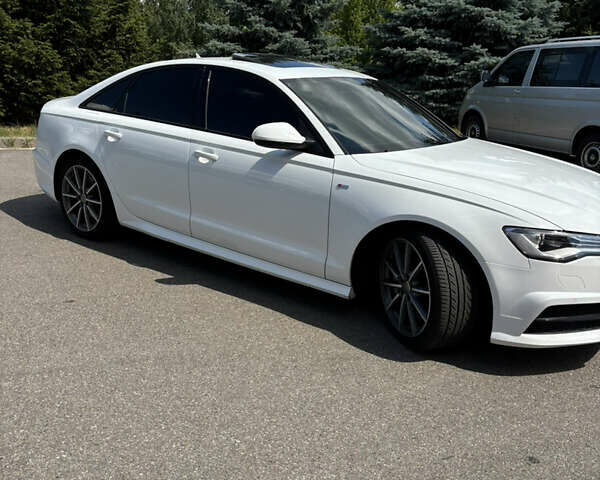 Белый Ауди А6, объемом двигателя 1.98 л и пробегом 127 тыс. км за 19700 $, фото 4 на Automoto.ua