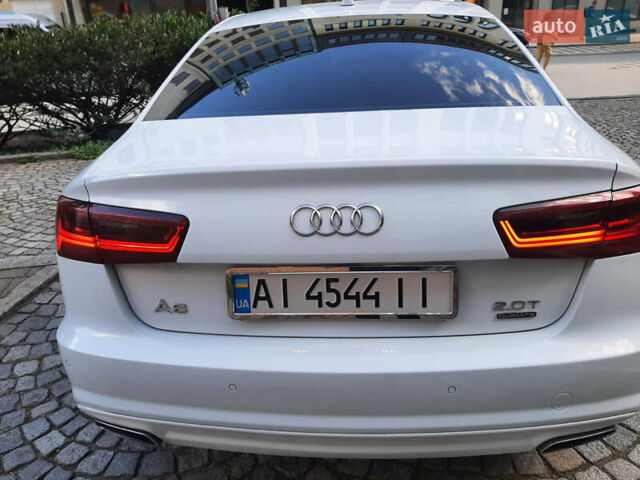 Белый Ауди А6, объемом двигателя 2 л и пробегом 144 тыс. км за 21999 $, фото 2 на Automoto.ua