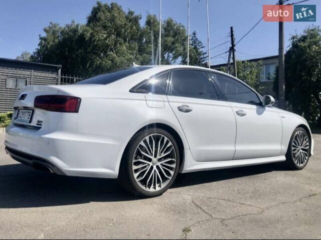 Белый Ауди А6, объемом двигателя 3 л и пробегом 175 тыс. км за 20650 $, фото 1 на Automoto.ua