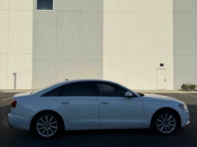 Белый Ауди А6, объемом двигателя 2 л и пробегом 71 тыс. км за 12000 $, фото 3 на Automoto.ua