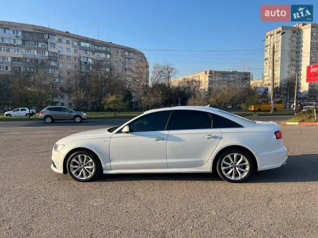 Белый Ауди А6, объемом двигателя 1.98 л и пробегом 130 тыс. км за 16700 $, фото 5 на Automoto.ua