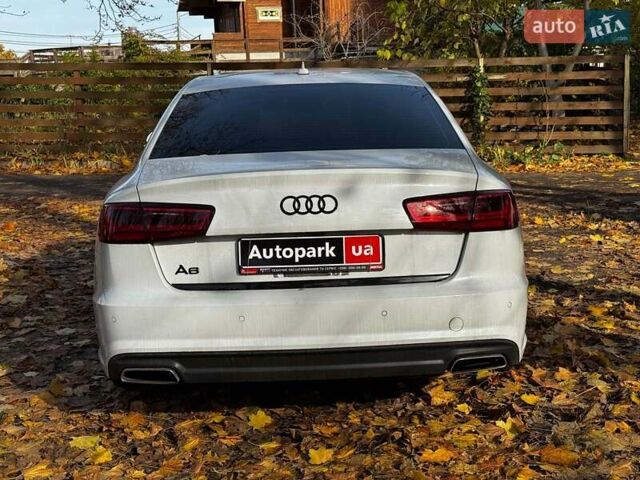 Білий Ауді А6, об'ємом двигуна 2 л та пробігом 89 тис. км за 21990 $, фото 7 на Automoto.ua