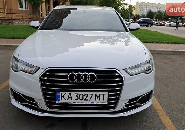 Белый Ауди А6, объемом двигателя 2 л и пробегом 155 тыс. км за 22999 $, фото 1 на Automoto.ua
