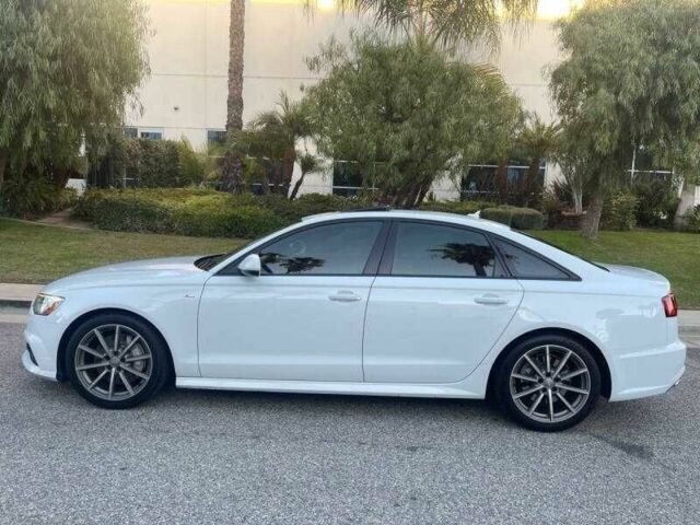Белый Ауди А6, объемом двигателя 2 л и пробегом 66 тыс. км за 4700 $, фото 5 на Automoto.ua