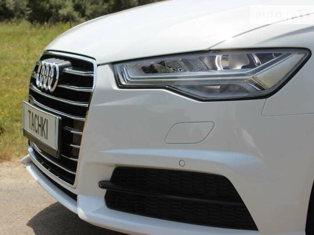 Білий Ауді А6, об'ємом двигуна 1.97 л та пробігом 90 тис. км за 27999 $, фото 26 на Automoto.ua