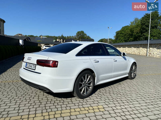 Белый Ауди А6, объемом двигателя 1.98 л и пробегом 150 тыс. км за 18500 $, фото 6 на Automoto.ua