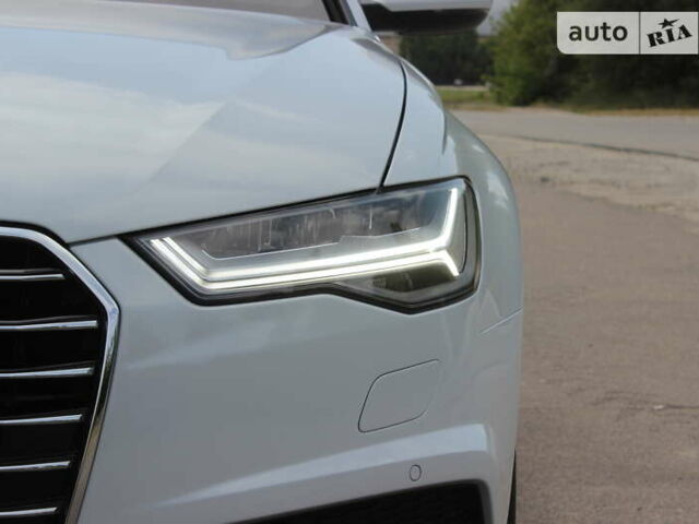 Білий Ауді А6, об'ємом двигуна 1.97 л та пробігом 90 тис. км за 27999 $, фото 75 на Automoto.ua