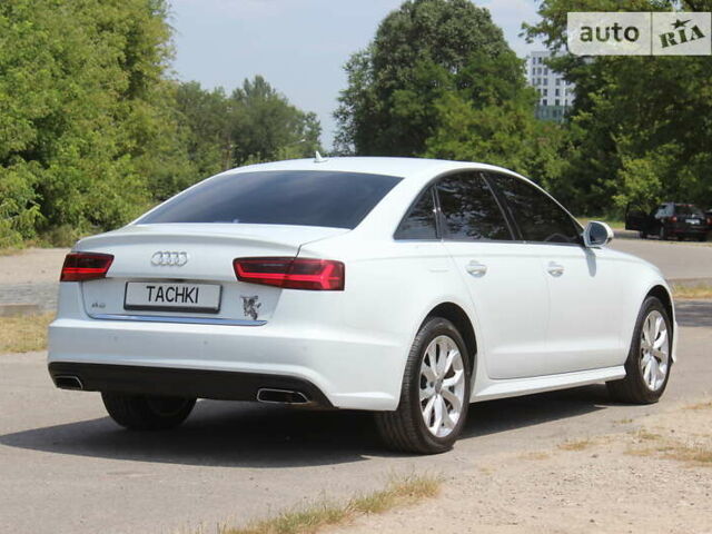 Білий Ауді А6, об'ємом двигуна 1.97 л та пробігом 90 тис. км за 27999 $, фото 2 на Automoto.ua