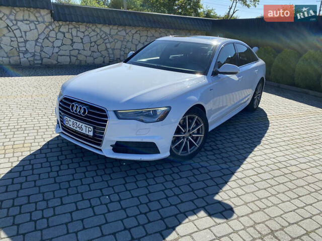 Белый Ауди А6, объемом двигателя 1.98 л и пробегом 150 тыс. км за 18500 $, фото 1 на Automoto.ua