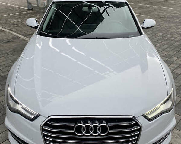 Белый Ауди А6, объемом двигателя 1.98 л и пробегом 73 тыс. км за 17300 $, фото 2 на Automoto.ua