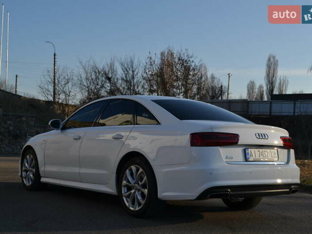 Белый Ауди А6, объемом двигателя 1.98 л и пробегом 185 тыс. км за 16700 $, фото 12 на Automoto.ua