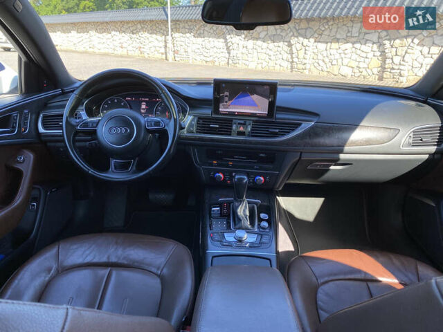 Белый Ауди А6, объемом двигателя 1.98 л и пробегом 150 тыс. км за 18500 $, фото 24 на Automoto.ua
