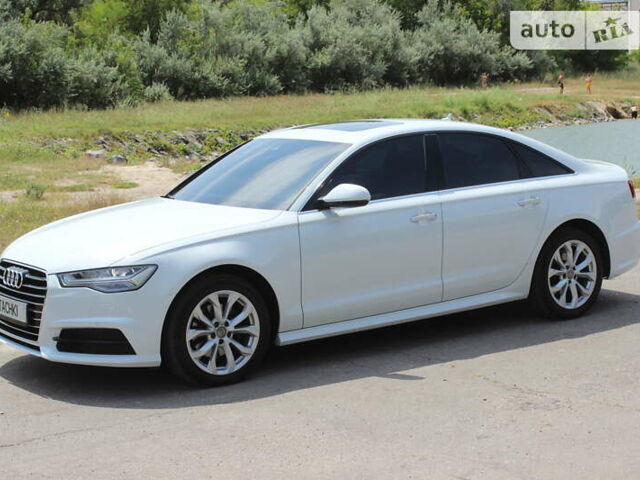 Білий Ауді А6, об'ємом двигуна 1.97 л та пробігом 90 тис. км за 27999 $, фото 1 на Automoto.ua