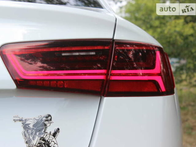 Білий Ауді А6, об'ємом двигуна 1.97 л та пробігом 90 тис. км за 27999 $, фото 77 на Automoto.ua