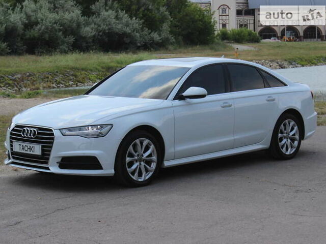 Білий Ауді А6, об'ємом двигуна 1.97 л та пробігом 90 тис. км за 27999 $, фото 4 на Automoto.ua