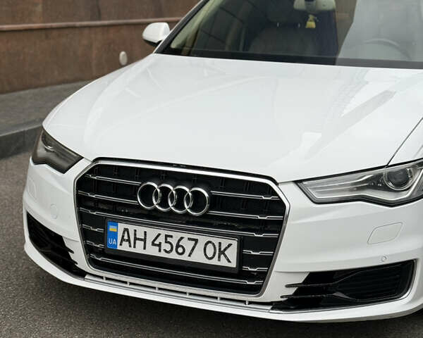 Белый Ауди А6, объемом двигателя 2 л и пробегом 143 тыс. км за 16900 $, фото 2 на Automoto.ua