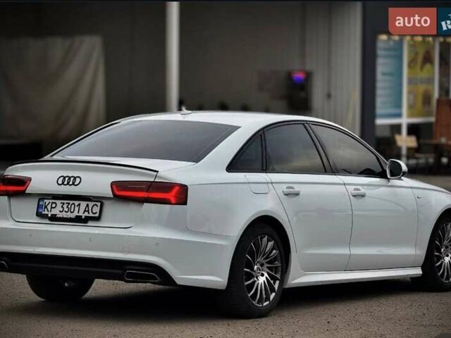 Білий Ауді А6, об'ємом двигуна 1.98 л та пробігом 71 тис. км за 16300 $, фото 3 на Automoto.ua