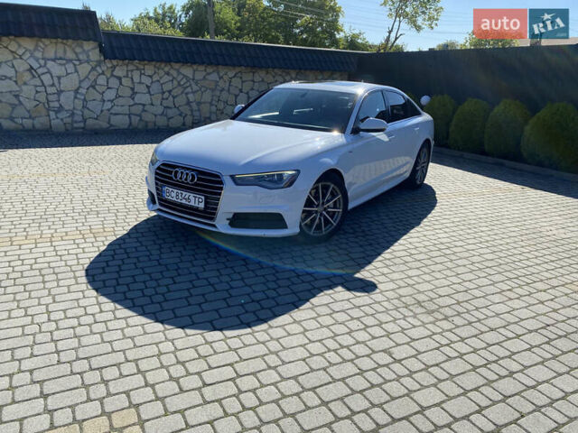 Белый Ауди А6, объемом двигателя 1.98 л и пробегом 150 тыс. км за 18500 $, фото 2 на Automoto.ua