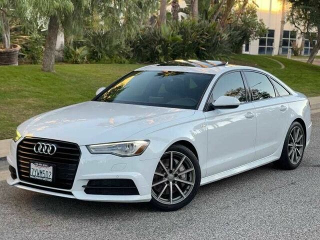 Белый Ауди А6, объемом двигателя 2 л и пробегом 66 тыс. км за 4700 $, фото 6 на Automoto.ua