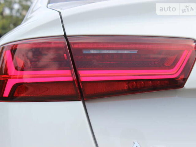 Білий Ауді А6, об'ємом двигуна 1.97 л та пробігом 90 тис. км за 27999 $, фото 76 на Automoto.ua