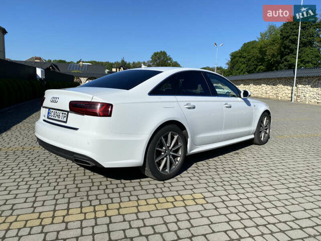 Белый Ауди А6, объемом двигателя 1.98 л и пробегом 150 тыс. км за 18500 $, фото 7 на Automoto.ua