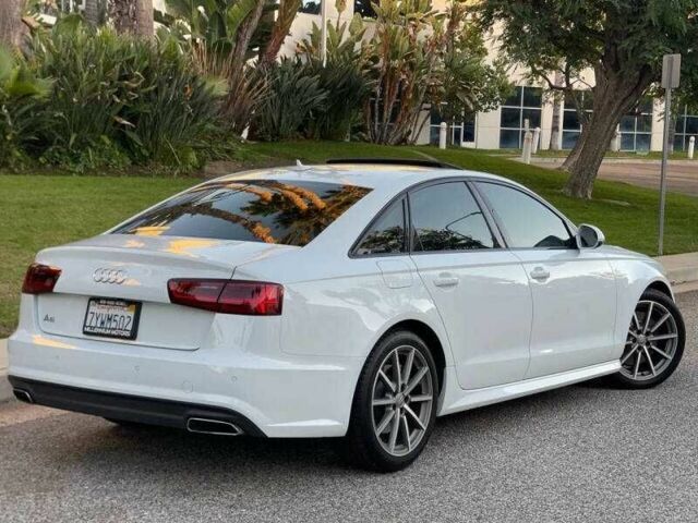 Белый Ауди А6, объемом двигателя 2 л и пробегом 66 тыс. км за 4700 $, фото 2 на Automoto.ua