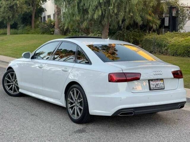 Белый Ауди А6, объемом двигателя 2 л и пробегом 66 тыс. км за 4700 $, фото 4 на Automoto.ua