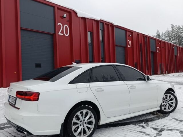 Білий Ауді А6, об'ємом двигуна 2 л та пробігом 127 тис. км за 16999 $, фото 2 на Automoto.ua