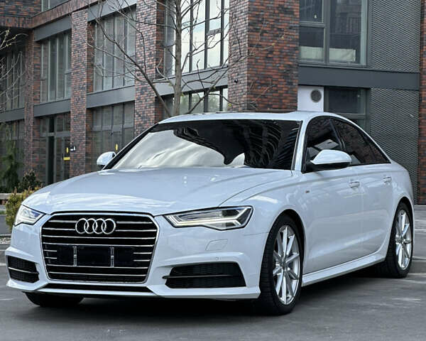 Белый Ауди А6, объемом двигателя 1.98 л и пробегом 71 тыс. км за 24000 $, фото 1 на Automoto.ua